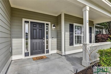 Covered front porch, perfect for a swing a couple 