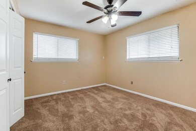 Spare room featuring carpet flooring, plenty of n