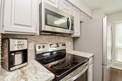 9400 Doliver Dr unit 27, Houston, TX 77063 - photo 7