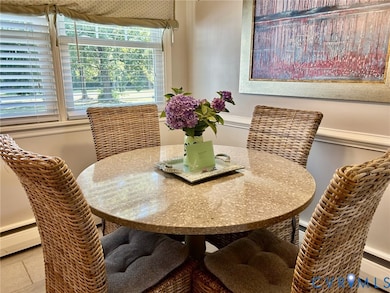 Dining space featuring a baseboard heating unit and baseboard heating
