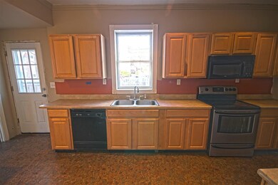 Laminate counter, double stainless steel sink, map