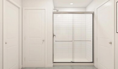 Primary bath with glass shower enclosure