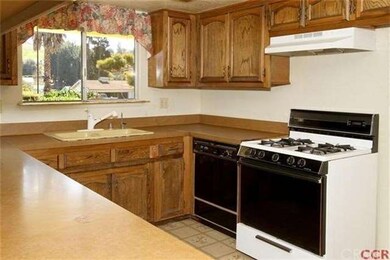Solid surface counters in kitchen.