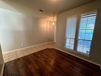 Spare room featuring hardwood / wood-style flooring