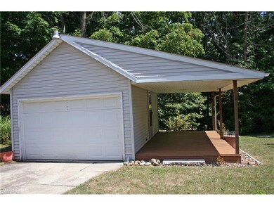 Garage has covered deck.