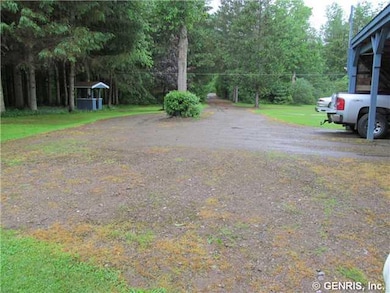 Land Drive from carport to road