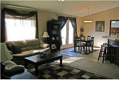 Living room view to dining area.