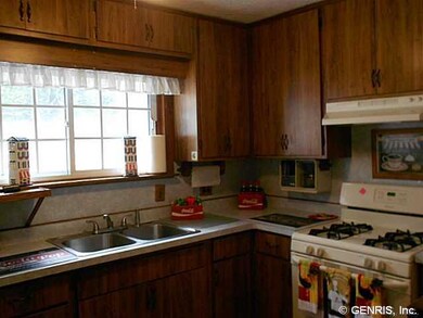 Kitchen. The kitchen comes equipped with a stove a