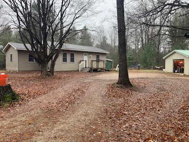 8387 E 7 Mile Rd, Luther, MI 49656 - photo 2