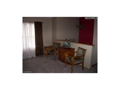 The half wall in the living room overlooks the ent