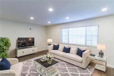 Living room featuring recessed lighting and wood finished floors