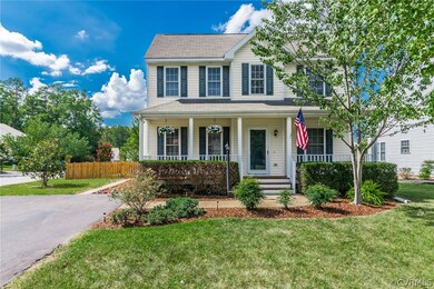 Exterior Front; Large paved driveway