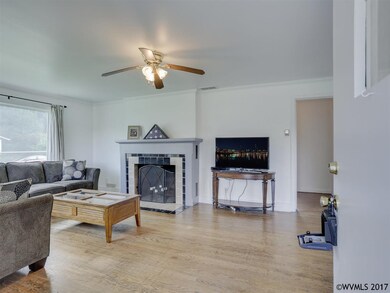Hardwoods, fireplace, coat closet, vinyl windows