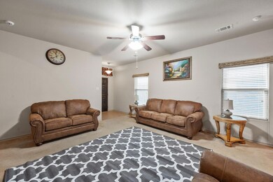 Window treatments include Roman shades