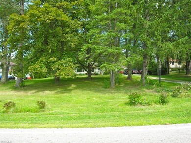 Home is set well back and shielded by trees from Remsen Road.