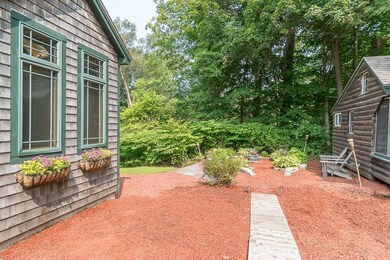 Walkway between main house and log...