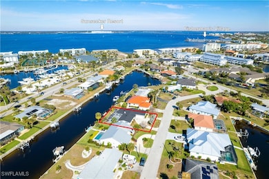 Drone / aerial view with a water view and a reside