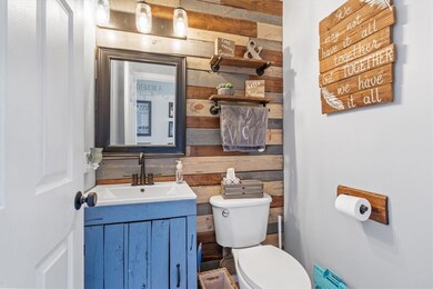 Remodeled first floor powder room in the entry way.
