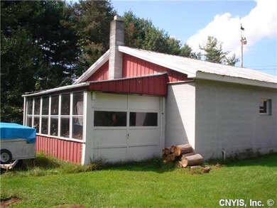 Garage. Garage with workshop in the rear, this is 