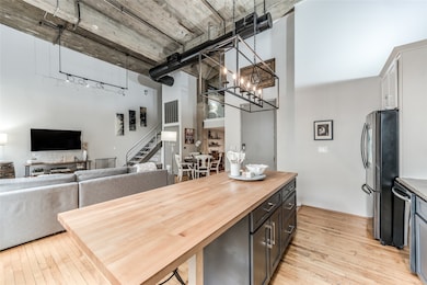 Impressive concrete ceilings span the main living