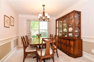 Formal Dining Room with detailed mouldings.