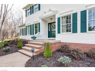 Inviting front porch with professional landscaping