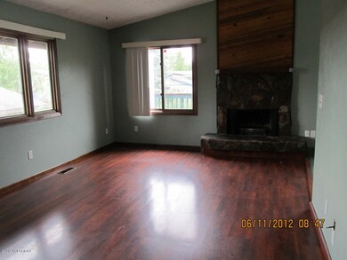 Living Room w/Stone Fireplace