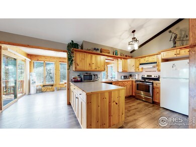 Open floor plan allows you to enjoying cooking in this nice kitchen, with a pass-through to the dining area.