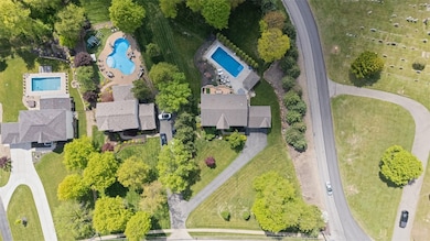 Aeriel view of home and pool