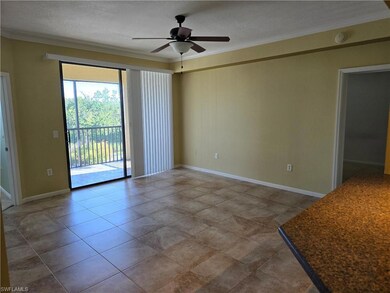 Spare room featuring tile patterned floors, a text