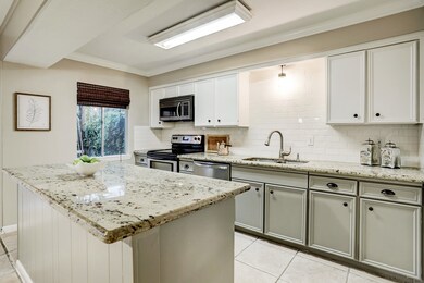 Updated beautiful kitchen with granite counters, a