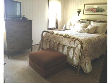 Master bedroom with new carpet, private 3 quarters