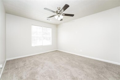 Unfurnished room with carpet floors and ceiling fan