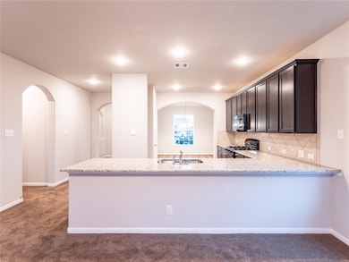Kitchen open to Family Room