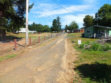 Lot on the right, looking East