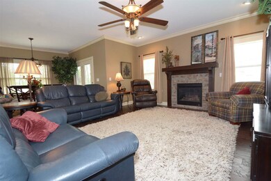 Beautiful hardwood floors flow throughout.