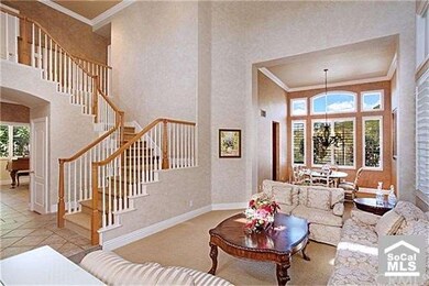 Bright and Sunny Dining Room Opens to Living Room 