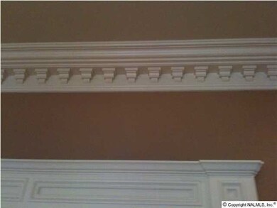 Custom-built Montgomery home boasts massive dental molding.