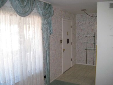 04 entry 10919 w cherry hills dr