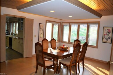Dining room has beautiful wood floors