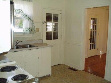 This view of the kitchen form the hallway door als