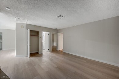 Unfurnished bedroom with light wood-type flooring,