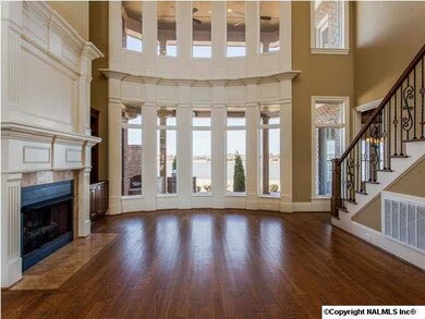 Heavy Crown molding hand crafted on site around Anderson windows.