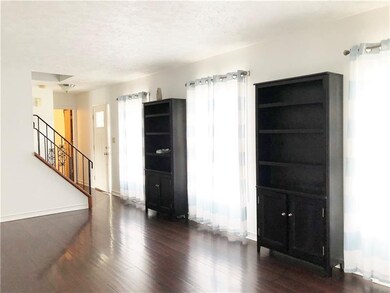 Spacious living room with ample light.