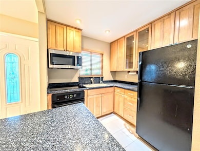 Nice maple cabinets and granite counters.