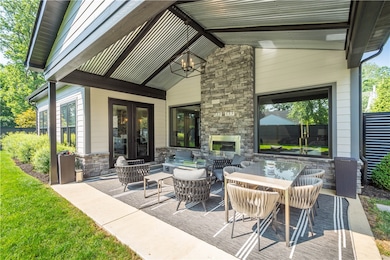 Great additional outdoor living space with  fireplace