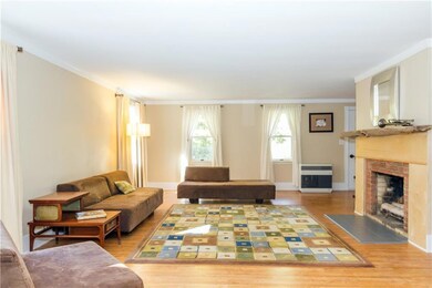 Living room with custom mantle for...