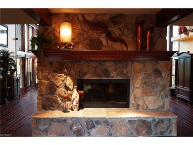 GORGEOUS STONE FIREPLACE , VISIBLE AS SOON AS YOU 