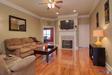 Beautiful Family Room with fire place, and wood fl