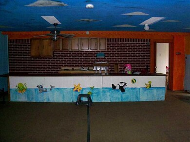 Family Room. Large room in back of home. Possible in law quarters.